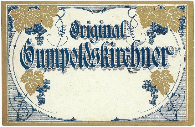 Ein altes deutsches Weinlabel mit einer Illustration von Trauben und Blättern und einem Text, der den Weinotyp angibt.