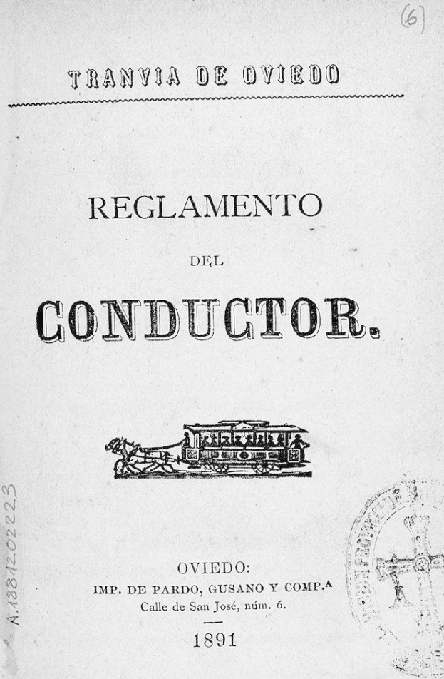Altes Buch mit dem Titel "Reglamento de Conductor" und einer Zug-Illustration auf dem Cover sowie einem Stempel auf der rechten Seite.