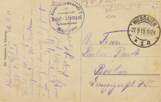 Alte Postkarte mit lila 'Wiesbaden, Deutschland - 1. Weltkrieg' Briefmarke und handgeschriebener Text.